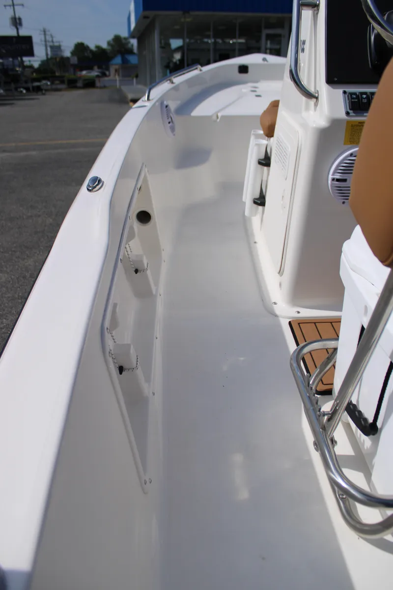 Slide: The Image of 2025 Key West 1720 Center Console boat interior with seating and console view. - 17