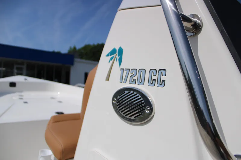 Slide: The Image of 2025 Key West 1720 Center Console boat with logo and speaker detail. - 24