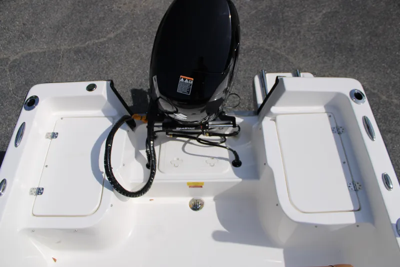 Slide: The Image of 2025 Key West 1720 Center Console boat with outboard motor, viewed from above. - 25