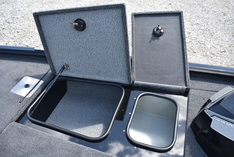 Slide: The Image of 2025 Lund 1875 Renegade SS boat storage compartments open, showcasing interior design. - 9
