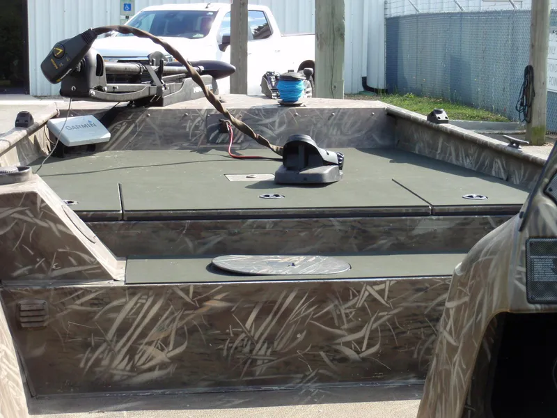 Slide: The Image of 2013 G3 1860 SC boat with camouflage design and trolling motor. - 6