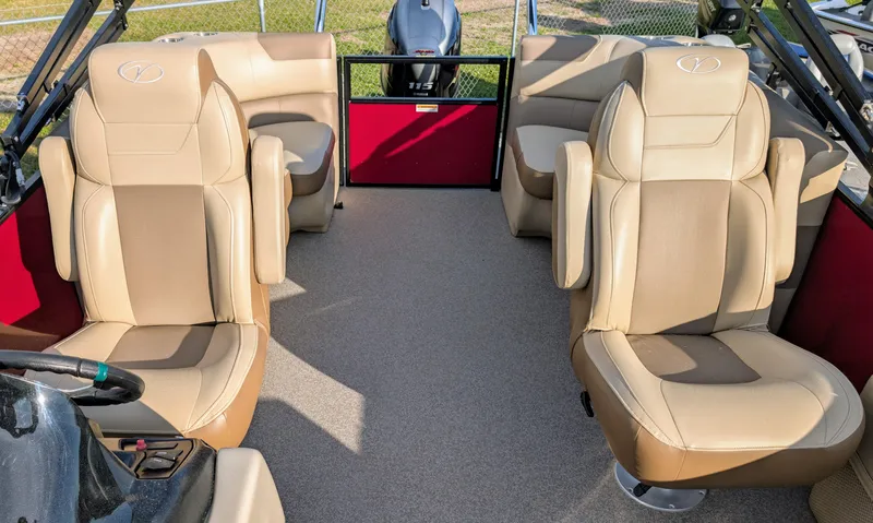Slide: The Image of 2023 Veranda VR20RC boat interior with beige seating and red accents. - 8