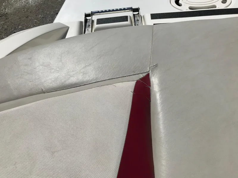 Slide: The Image of Torn upholstery on 2005 Larson Senza 186 I/O boat seat. - 25