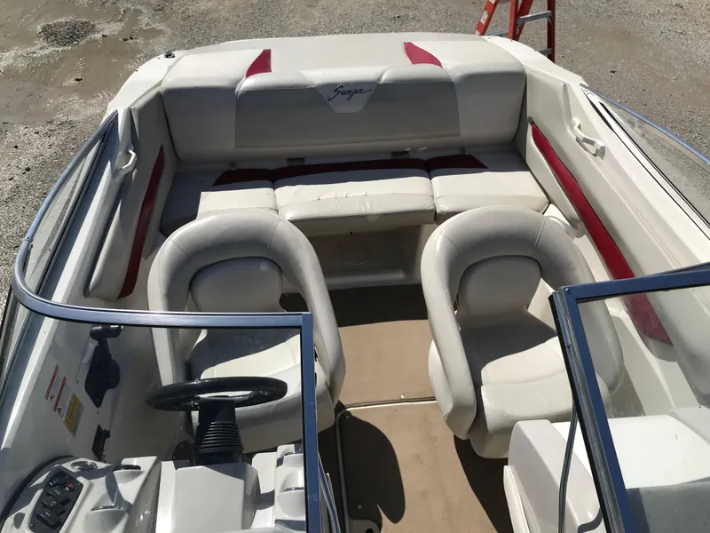 Slide: The Image of 2005 Larson Senza 186 I/O boat interior with white and red seating. - 27