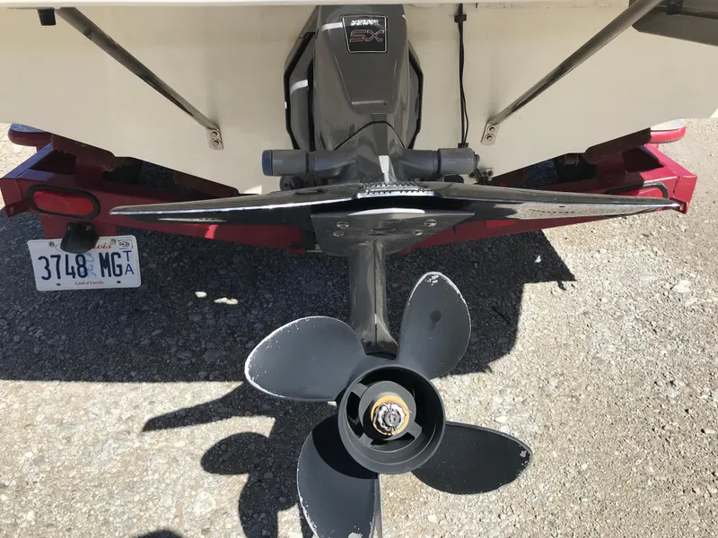 Slide: The Image of Rear view of 2005 Larson Senza 186 I/O boat with propeller and trailer. - 32