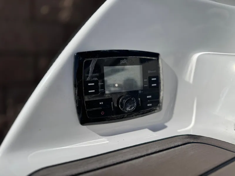 Slide: The Image of Control panel on 2016 Yamaha Boats 242 Limited E-Series, featuring a sleek design. - 10