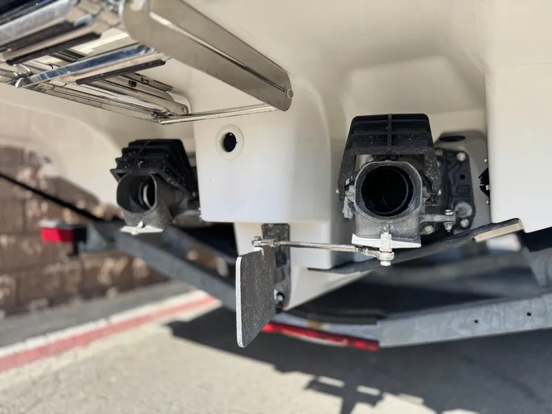 Slide: The Image of 2016 Yamaha Boats 242 Limited E-Series jet nozzles and trailer detail. - 11