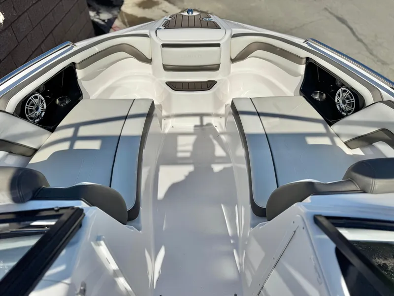Slide: The Image of 2016 Yamaha Boats 242 Limited E-Series interior with seating and speakers. - 15