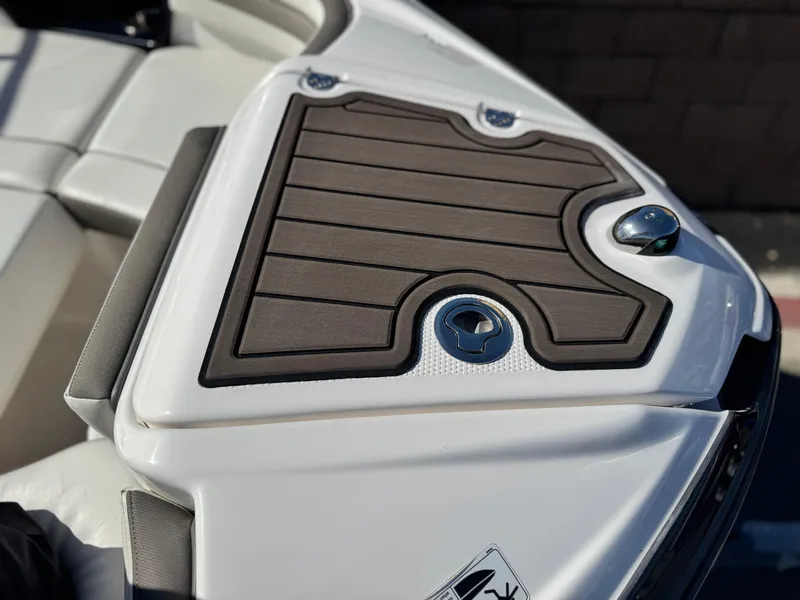 Slide: The Image of 2016 Yamaha Boats 242 Limited E-Series deck detail with sleek design and modern features. - 16