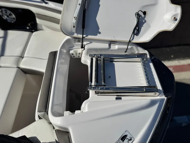 Slide: The Image of 2016 Yamaha Boats 242 Limited E-Series swim platform with ladder. - 17