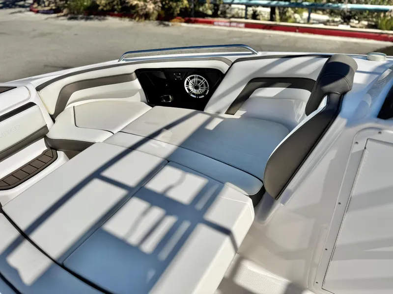 Slide: The Image of 2016 Yamaha Boats 242 Limited E-Series interior with sleek seating and modern design. - 20