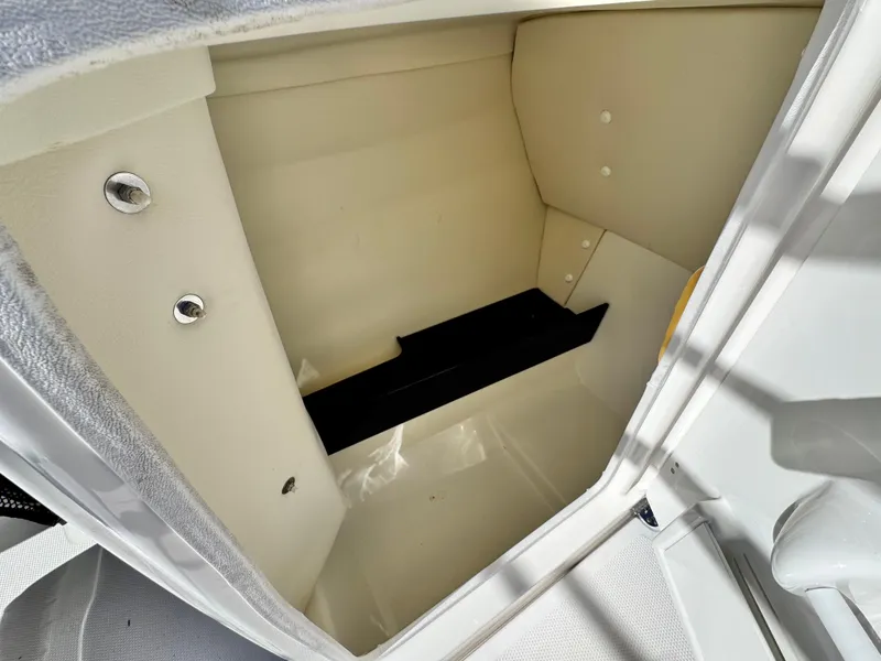 Slide: The Image of Storage compartment in 2016 Yamaha Boats 242 Limited E-Series, featuring a clean, spacious interior. - 29