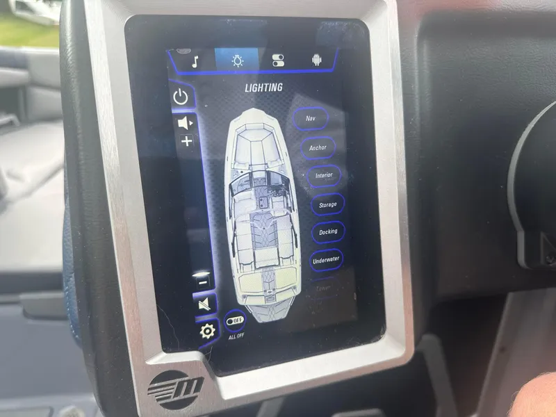 Slide: The Image of Touchscreen control panel in a 2022 Malibu M220 boat, displaying lighting options. - 12