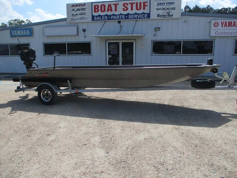 Slide: The Image of 2025 Gator Tail 2048 EXTREME boat on trailer outside dealership. - 0