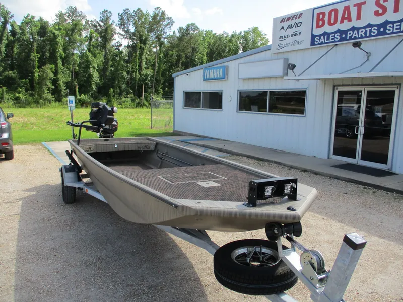 Slide: The Image of 2025 Gator Tail 2048 EXTREME boat on trailer outside dealership. - 4