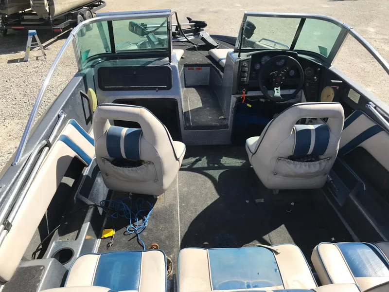 Slide: The Image of Interior of a 1994 ProCraft COMBO 200 boat with dual seats and steering console. - 16