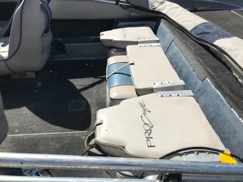 Slide: The Image of 1994 ProCraft COMBO 200 boat interior with cushioned seating and carpeted flooring. - 33