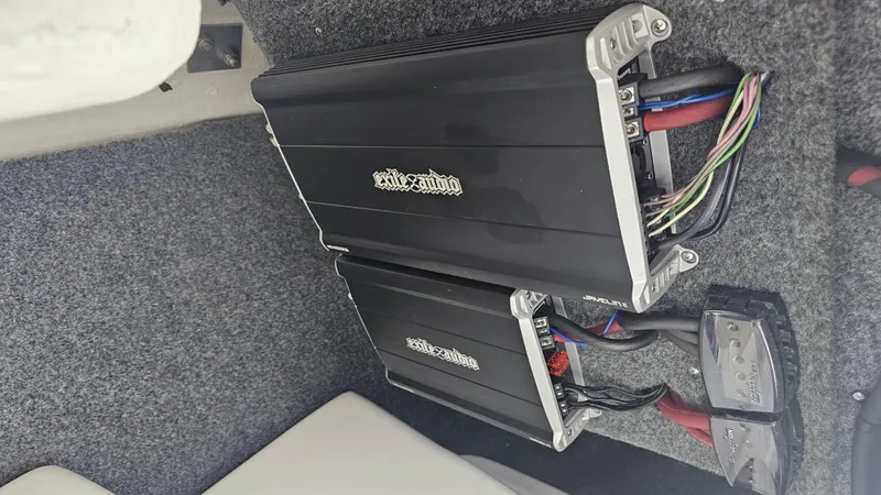 Slide: The Image of Audio amplifiers installed in a 2014 Yamaha Boats AR210. - 24