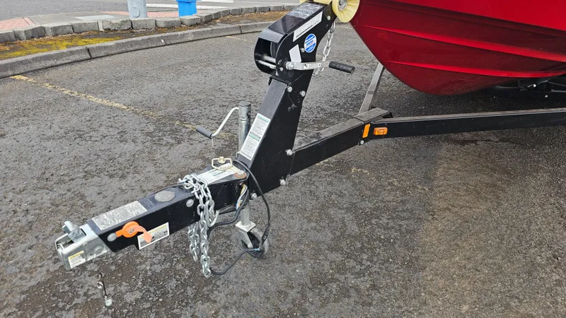 Slide: The Image of Trailer hitch of a 2014 Yamaha Boats AR210, parked on asphalt. - 26
