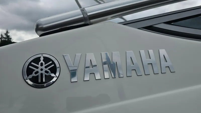 Slide: The Image of 2014 Yamaha AR210 boat logo with chrome lettering and emblem. - 8