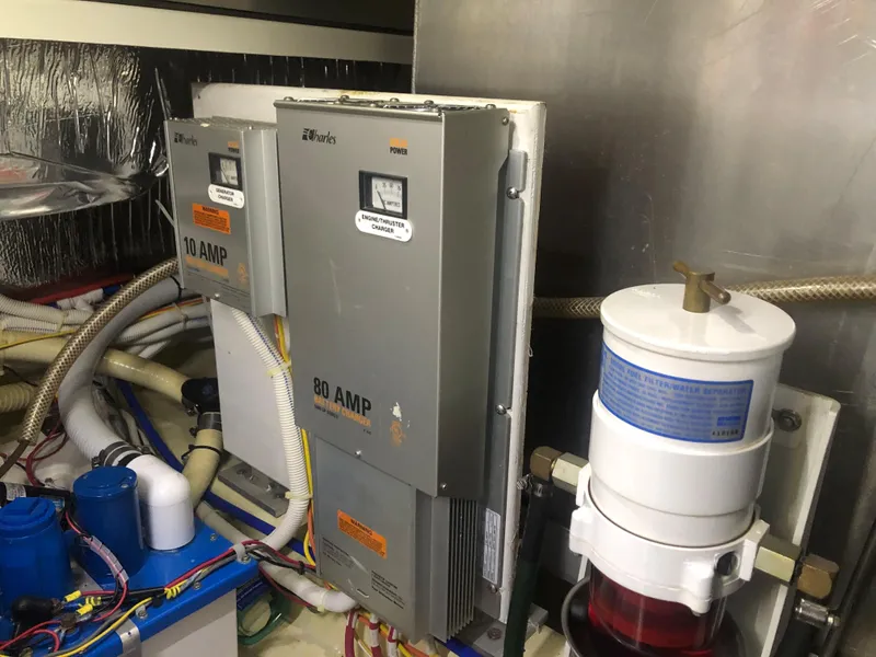 Slide: The Image of Engine room of 2006 Carver 43 Motor Yacht with electrical components and filters. - 33