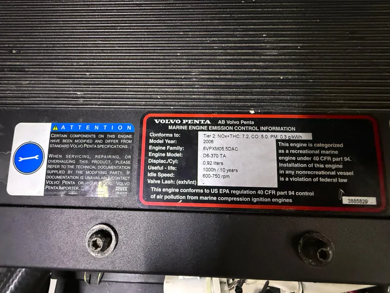 Slide: The Image of Engine information label on a 2006 Carver 43 Motor Yacht, featuring Volvo Penta details. - 43