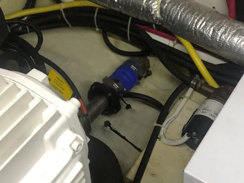 Slide: The Image of Engine room of 2006 Carver 43 Motor Yacht with visible wiring and components. - 25