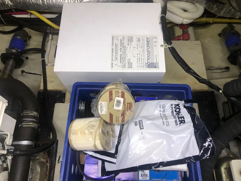 Slide: The Image of Engine room of 2006 Carver 43 Motor Yacht with maintenance supplies and equipment. - 28