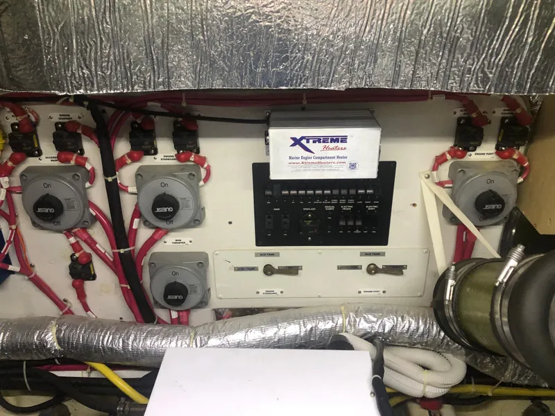 Slide: The Image of Electrical panel of a 2006 Carver 43 Motor Yacht with wiring and switches. - 29