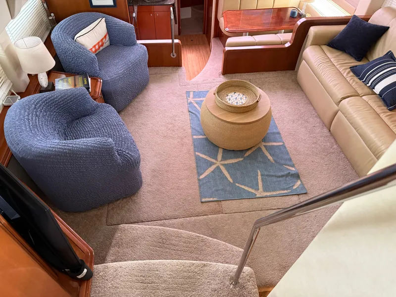 Slide: The Image of Interior of 2006 Carver 43 Motor Yacht with cozy seating and stylish decor. - 36