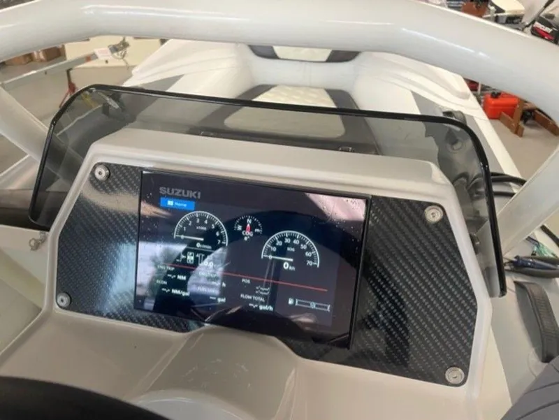 Slide: The Image of Dashboard of 2025 Highfield Sport 390 boat with Suzuki display. - 4
