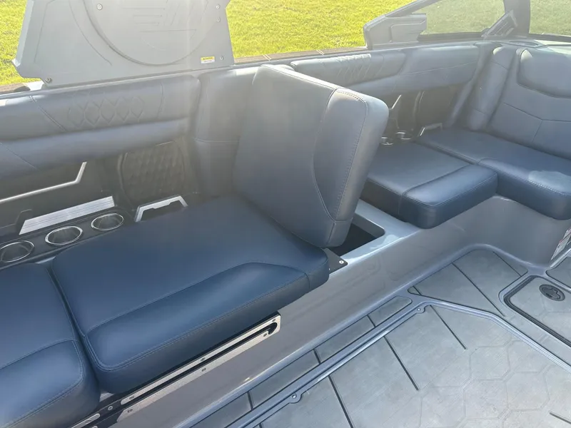 Slide: The Image of 2020 Malibu M240 boat interior with luxurious seating and modern design. - 12