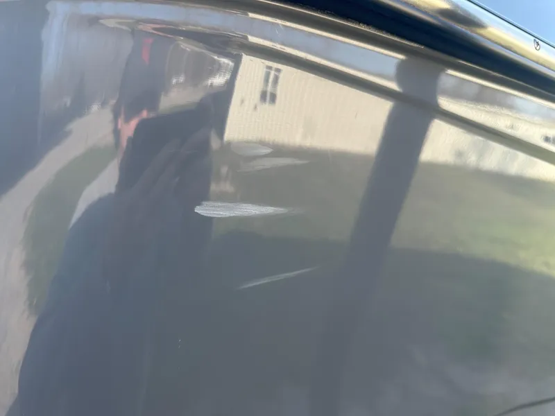 Slide: The Image of 2020 Malibu M240 boat exterior reflecting surroundings. - 21