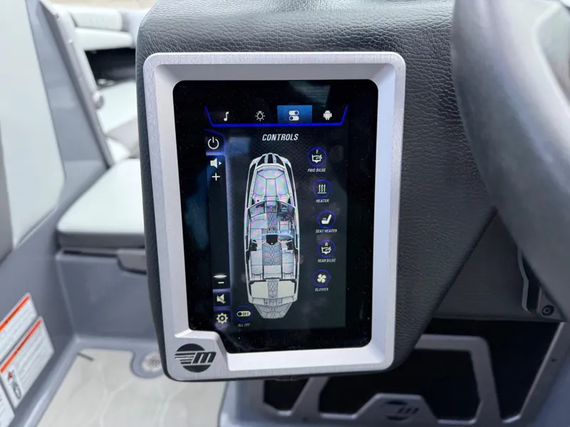 Slide: The Image of Touchscreen control panel in 2021 Malibu M240 boat, displaying navigation and settings interface. - 18