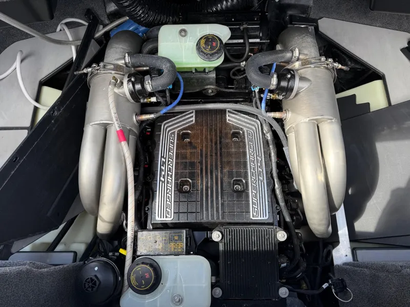 Slide: The Image of 2021 Malibu M240 engine with supercharger, showcasing advanced marine engineering. - 30