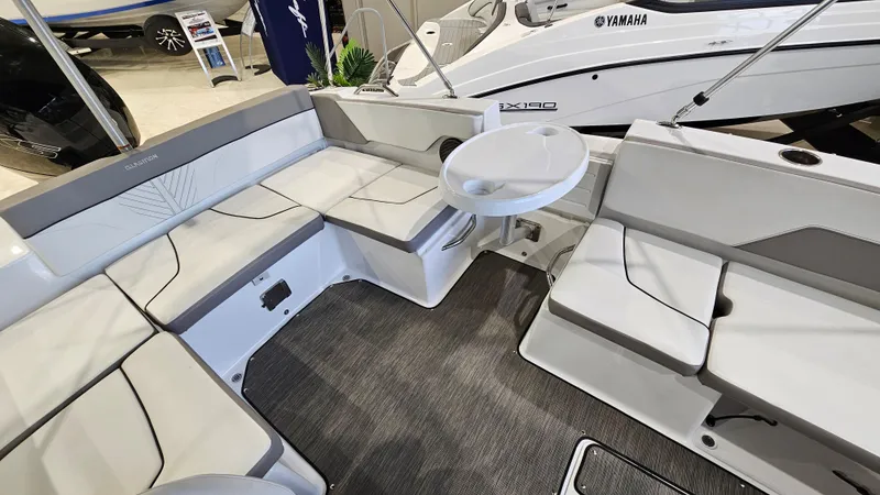 Slide: The Image of 2022 Glastron GTD 180 boat interior with spacious seating and modern design. - 10