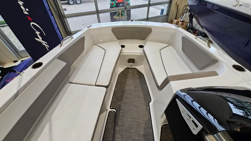 Slide: The Image of 2022 Glastron GTD 180 boat interior with spacious seating and modern design. - 12