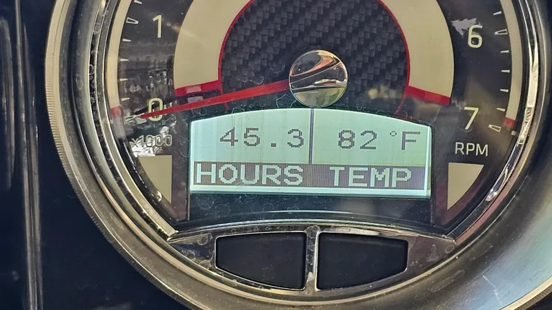 Slide: The Image of Dashboard of 2022 Glastron GTD 180 showing 45.3 hours and 82°F temperature. - 18