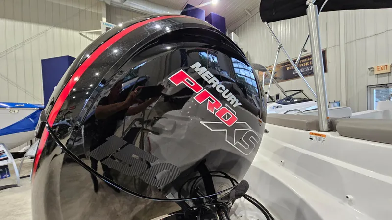 Slide: The Image of 2022 Glastron GTD 180 with Mercury Pro XS outboard motor in showroom. - 4