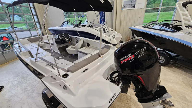 Slide: The Image of 2022 Glastron GTD 180 boat with Mercury Pro XS engine in showroom. - 5