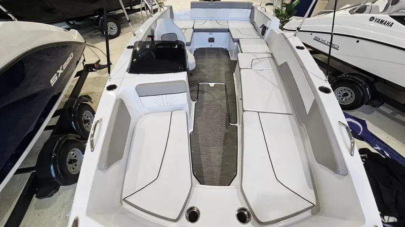 Slide: The Image of 2022 Glastron GTD 180 boat interior with spacious seating and modern design. - 7