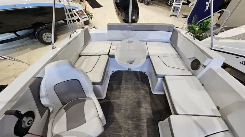 Slide: The Image of 2022 Glastron GTD 180 boat interior with white seating and modern design. - 9