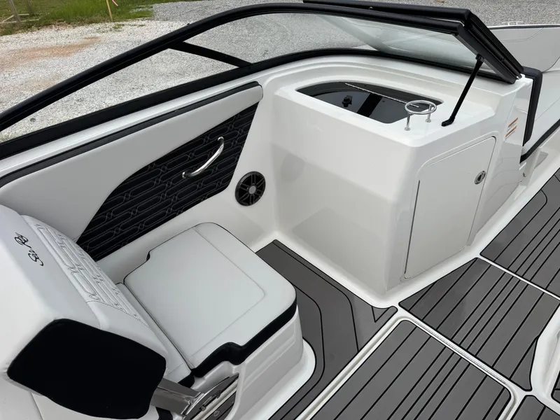 Slide: The Image of 2024 Sea Ray SPX 210 OB boat interior with sleek seating and modern design. - 10