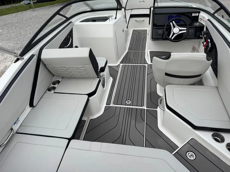Slide: The Image of 2024 Sea Ray SPX 210 OB boat interior with modern seating and sleek design. - 7