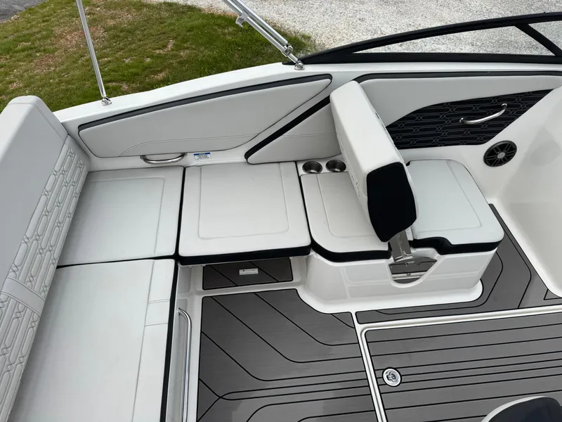 Slide: The Image of 2024 Sea Ray SPX 210 OB boat interior with sleek seating and modern design. - 8