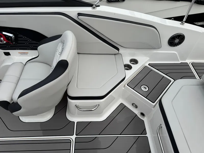 Slide: The Image of 2024 Sea Ray SPX 210 OB boat interior with sleek seating and modern design. - 9