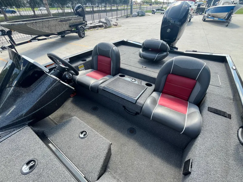 Slide: The Image of 2017 Ranger RT 198P boat interior with red and gray seating. - 7