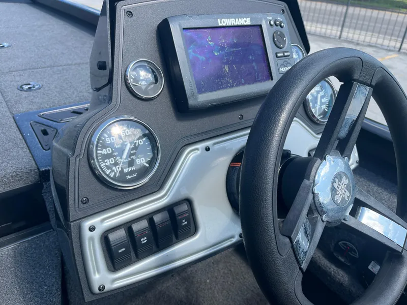 Slide: The Image of 2017 Ranger RT 198P boat dashboard with Lowrance GPS and gauges. - 9