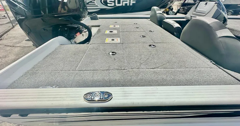 Slide: The Image of 2018 Lund 1875 Pro-V Bass boat with spacious deck and seating. - 9