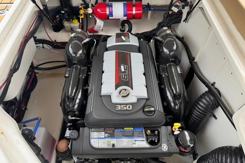 Slide: The Image of 2025 Sea Ray SDX 250 engine compartment with 6.2L 350 horsepower engine. - 20